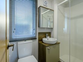 A bathroom with a sink and toilet at Horncastle Plus in Louth