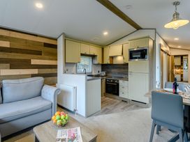 A kitchen with appliances and seating area at Alford WF, Louth