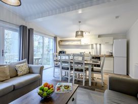 A kitchen and dining area with furniture at Stamford Spa in Louth