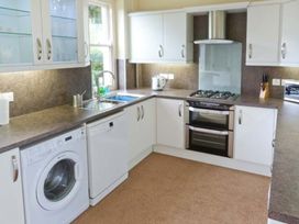 A kitchen with appliances and countertop at Priory View in Ulverston