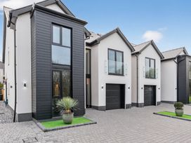A house with windows and garage at Ty Uchel