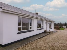 A bungalow facade with windows and front door at Bungalow Falcarragh in Falcarragh, County Donegal