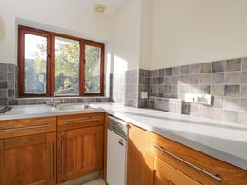 A kitchen with sink and cabinets at Lady Of Lourdes Whitchurch, Herefordshire