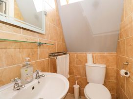 A bathroom with a sink and toilet at Lady Of Lourdes in Whitchurch, Herefordshire