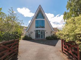 A house with large windows and a driveway at Lady Of Lourdes in Whitchurch, Herefordshire