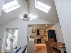 A kitchen with skylights and modern appliances at Cove Retreat in Penzance