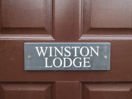 A door with a nameplate at Winston Lodge in Beccles