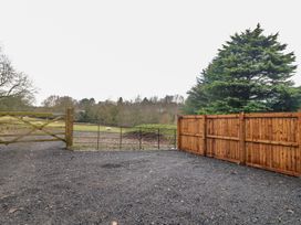 An outdoor area with a gate and fence at Park View Lodge