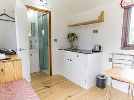 A kitchen with a sink and kettle at No 1 The Orchard Upton Warren
