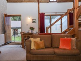 A living room with a table and chairs at Swallows Nest Widecombe-in-the-Moor near Postbridge