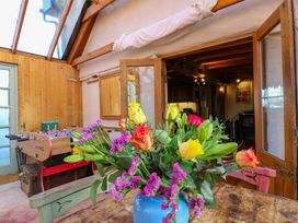 A snug area with a table and foosball table at Town Farm in 