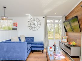 A living room with a sofa and coffee table at The Elton in Kings Cliffe