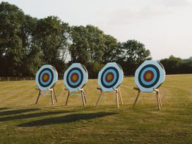 Four archery targets set up on grass at The Kingscliffe (Pet) Kings Cliffe