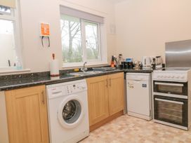 A kitchen with appliances and countertops at Orchard End in Launceston