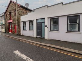 A house exterior with a door and windows at 20 Lorton Street in Cockermouth