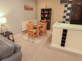 A dining area with a table and chairs at 20 Lorton Street in Cockermouth
