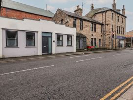 A building with a front door and windows at 20 Lorton Street in Cockermouth