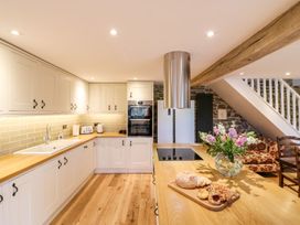 A kitchen with a sink, toaster and oven at Lake View in Crediton