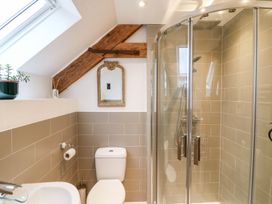 A bathroom with a shower and toilet at Lake View in Crediton