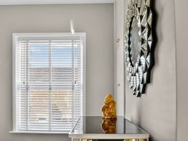 A room with a window and decorative items at Windsor House in York