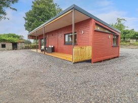 A cabin with a patio in front at Killinure Cottage, Glasson, County Westmeath