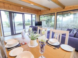 A dining room with a table set for dinner at Killinure Cottage Glasson County Westmeath