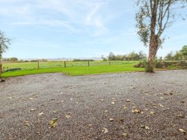 An outdoor area with gravel and grass at Killinure Cottage in Glasson, County Westmeath