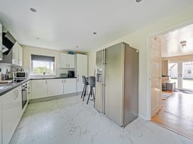 A kitchen with modern appliances and counter at Charcoal Lodge in Brigg