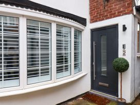 A front entrance with a door and windows at OG's House in Whitby
