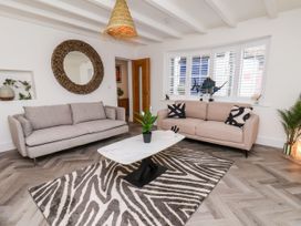 A living room with sofas and a coffee table at Og's House in Whitby
