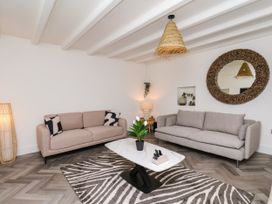 A living room with two sofas and a coffee table at Og's House in Whitby