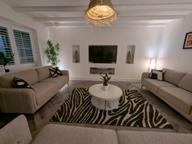 A living room with two couches and a coffee table at Og's House in Whitby