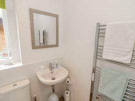 A bathroom with a sink and toilet at Harbour View Poole in Poole