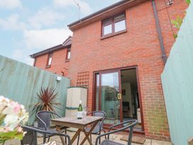 An outdoor area with seating furniture at Poole Quay Cottage in Poole