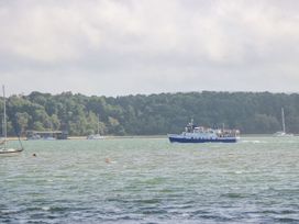 A boat on the water at Poole Quay Cottage in Poole