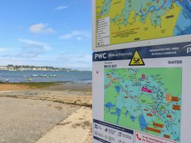 A direction sign with a map at Baiter in Poole Harbour