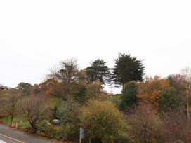 A view of trees and road at Beachwalk Villa 2 in Whitby