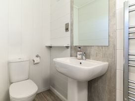 A bathroom with a sink and toilet at Grasmere (Pet) Penrith