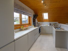 A kitchen with a sink and countertop at Senara Hot Tub Lodge (Pet) Portreath