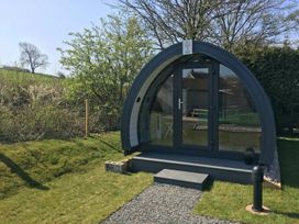 A pod with a door and steps at Pod 3 (No Pets) Carnforth