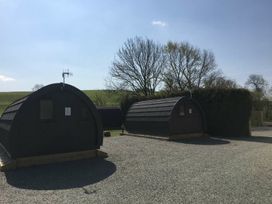 Glamping pods in an outdoor area at Pod 4 (No Pets) in Carnforth