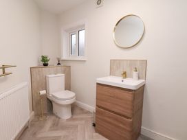 A bathroom with a sink and toilet at Maxwell View in Scarborough