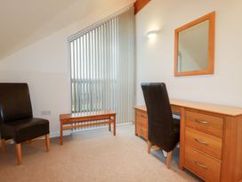 An office with a desk and chair at 65 Benasa Lodge in Winnard's Perch near St Columb Major