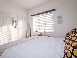 A bedroom with a bed and a window at 33 Fordh Tobmen St. Agnes
