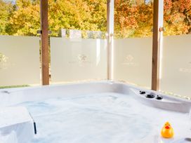 A hot tub with water jets and a rubber duck at Imperial View in Waltham