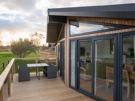An outdoor area with a table and chairs at The Royal in Waltham