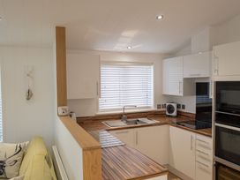 A kitchen with a sink and countertop at The Royal in Waltham