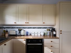 A kitchen with appliances and containers at Macosi in Waltham