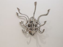 A coat hook mounted on a wall at Ty'n Lon in Pwllheli