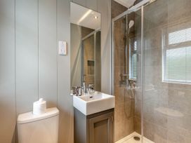 A bathroom with a shower and sink at Argel in Praze-An-Beeble